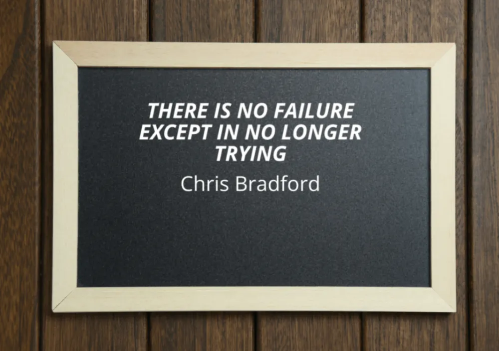 Inspirational image with the quote 'There is no failure except in no longer trying.' by Chris Bradford.