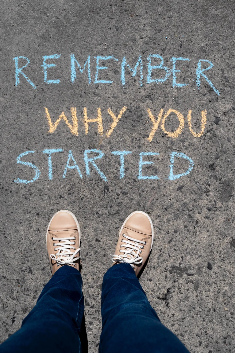 Inspirational image displaying the quote ‘Remember why you started’ in bold text