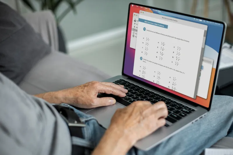 A high-quality Apple laptop in your hands combines sleek design and powerful performance for on-the-go productivity.